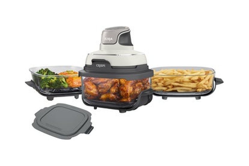 Ninja Crispi 5-in-1 glass air fry system with three glass containers of food and the lid unit