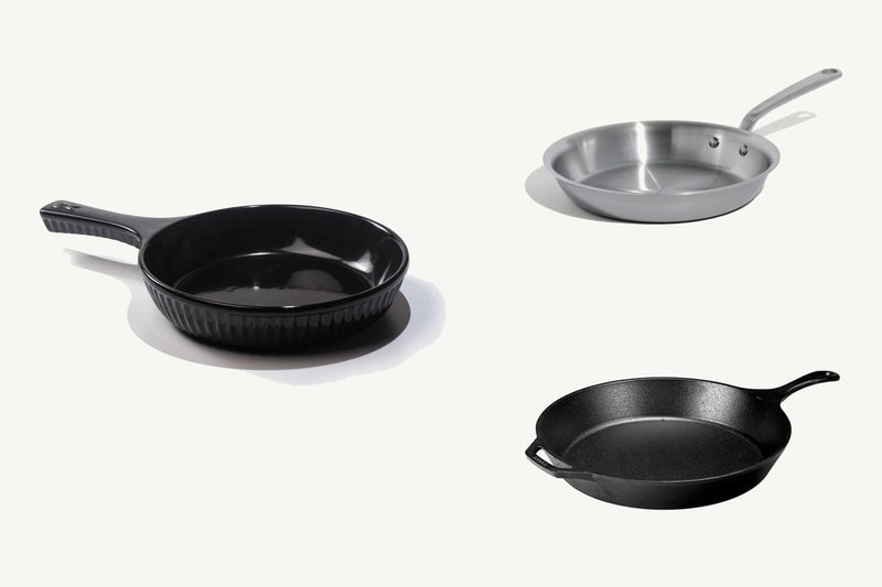 Three uncoated pans: a black Xtrema solid ceramic skillet, a Made In stainless clad frying pan and a Lodge cast iron skillet